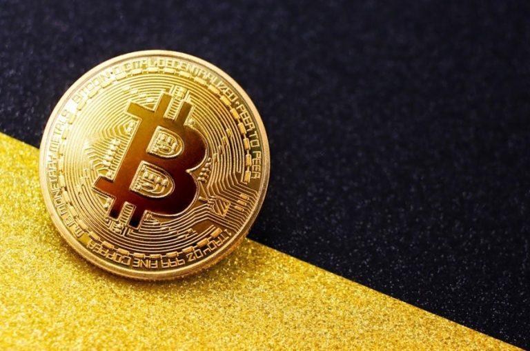 bitcoin coin on glitter background